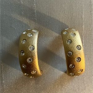 Beautiful gold tone crystal half hoop earrings by Swarovski.